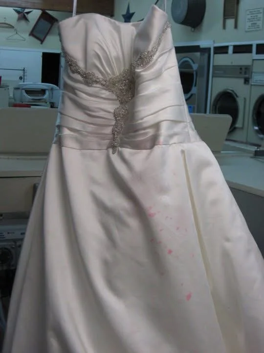 Paint-stained satin gown, after cleaning